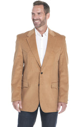 Man wearing a western camel blazer over a white shirt on a white background