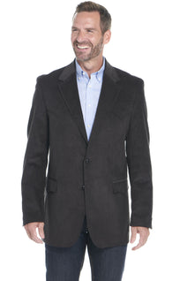 Man wearing a western grey blazer over a light blue shirt on a white background