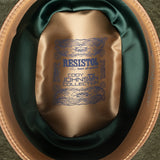 Resistol hat with Cody Johnson Collection label inside a green and brown hat box