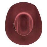 Burgundy cowboy hat on a white background